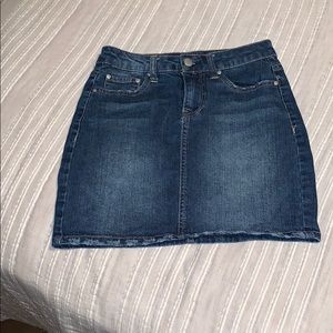 a dark blue jean skirt